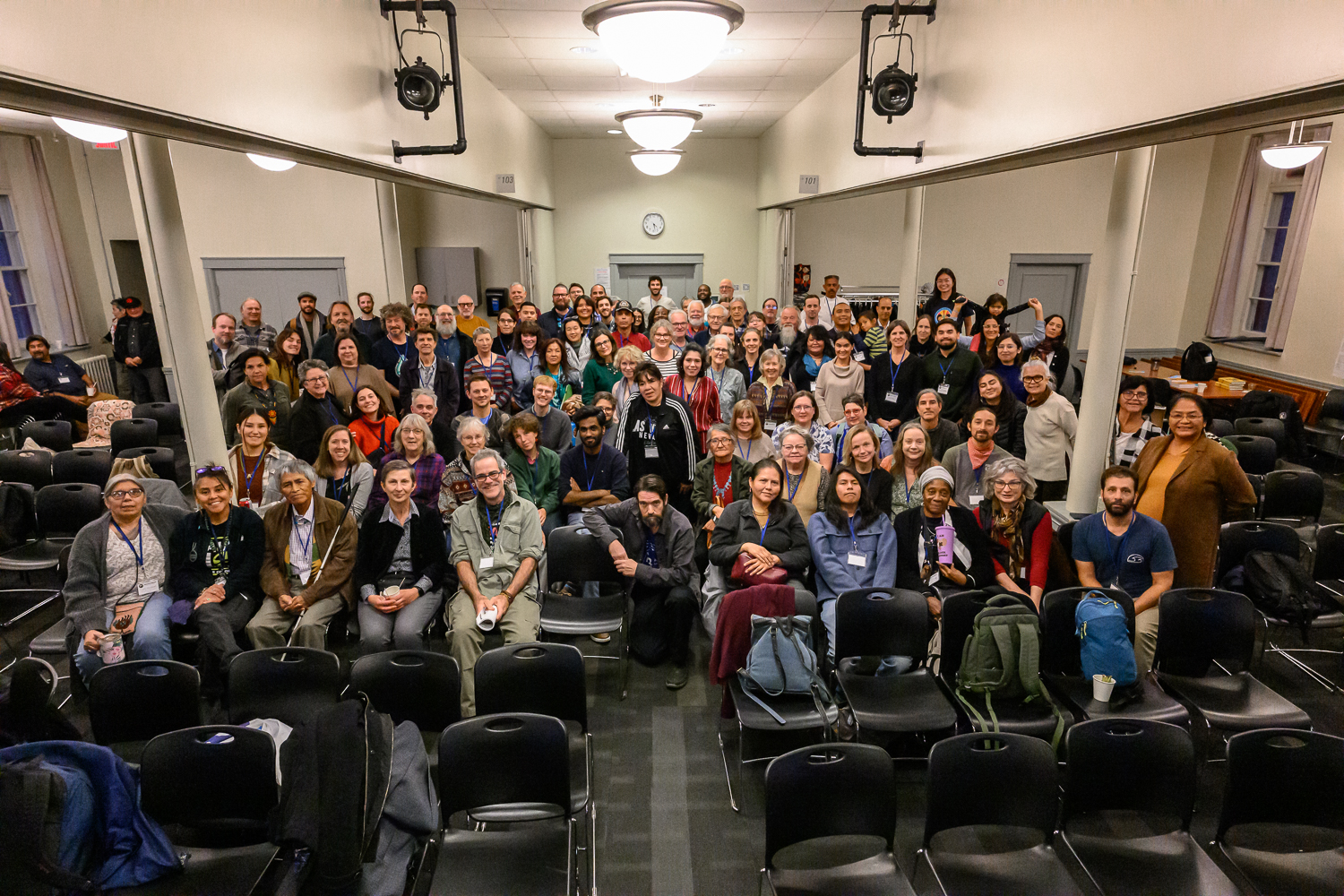 a large group of people in a conference room