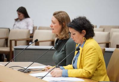 two women testifying at the legislature