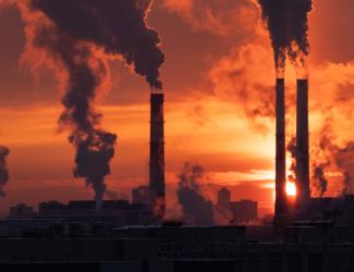 gas stacks with red background pollution