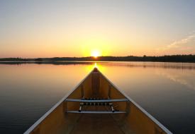 a canoe looking at the horizon